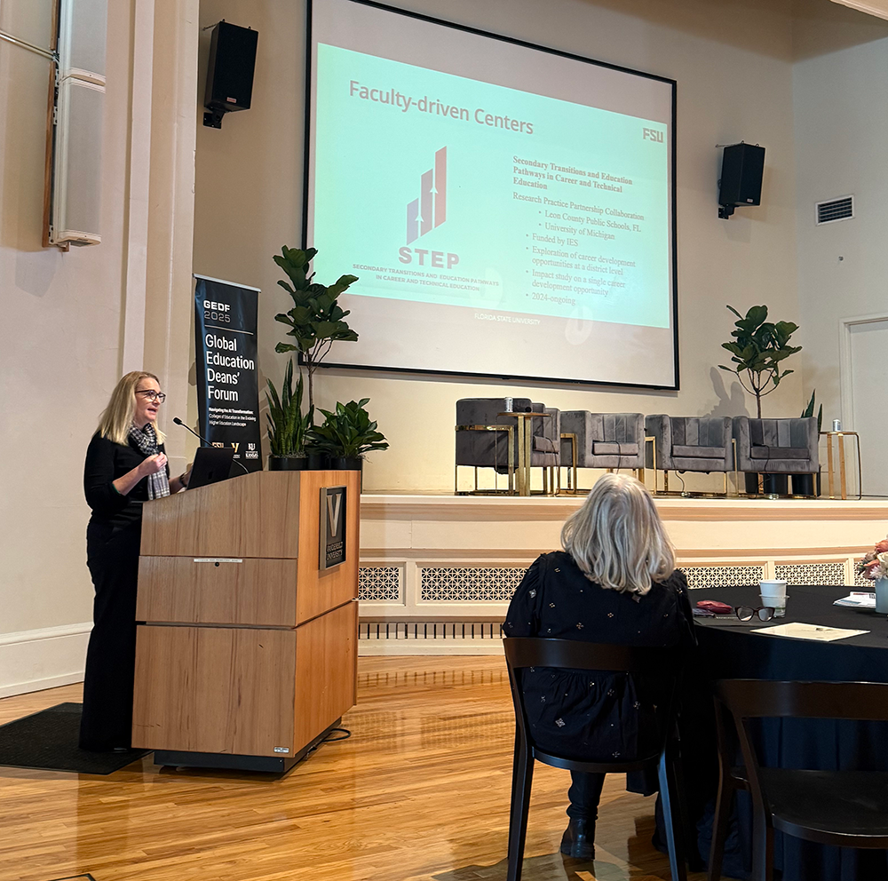 Stacey Rutledge speaks at a podium