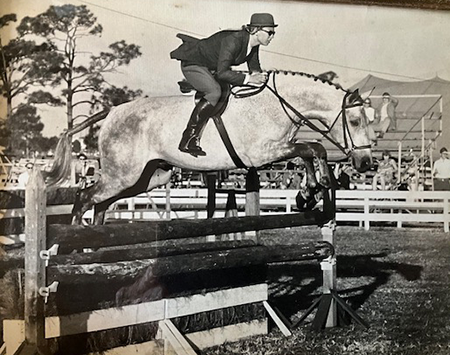 Sandy Shultz riding the famous show horse Dun Raven