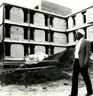Jack Gant surveys the construction of the Stone Building