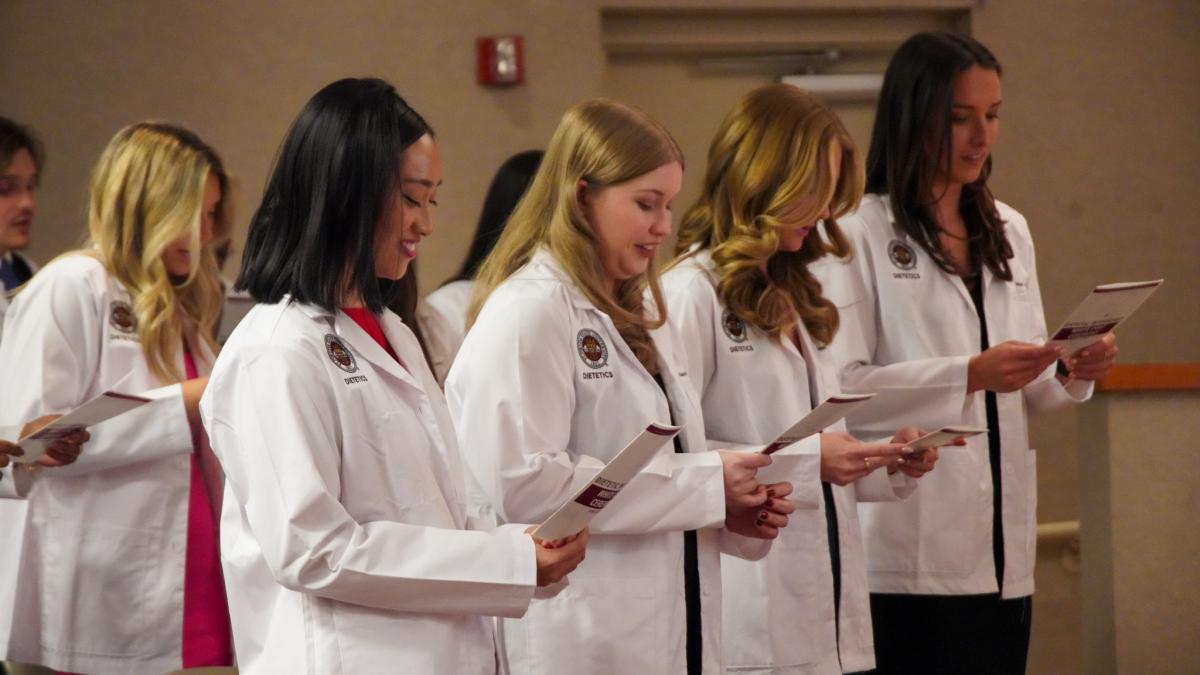 students attending FSU white coat ceremony