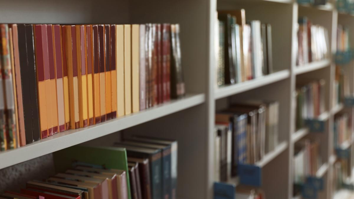 Old books on library shelf