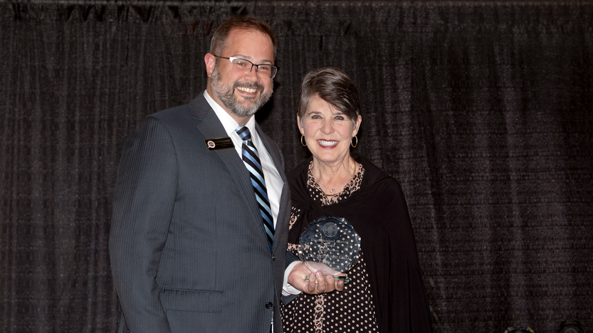 Stef Gall (right) and Kevin Derryberry (left) at an awards ceremony