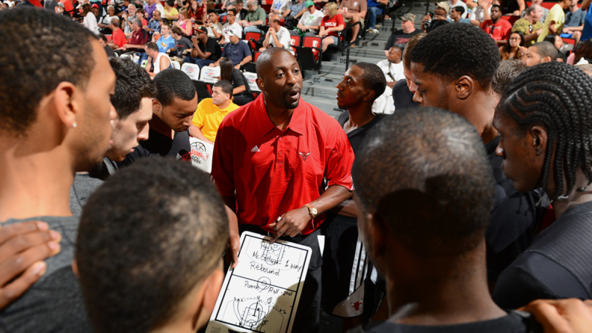 Coach is talking to his team