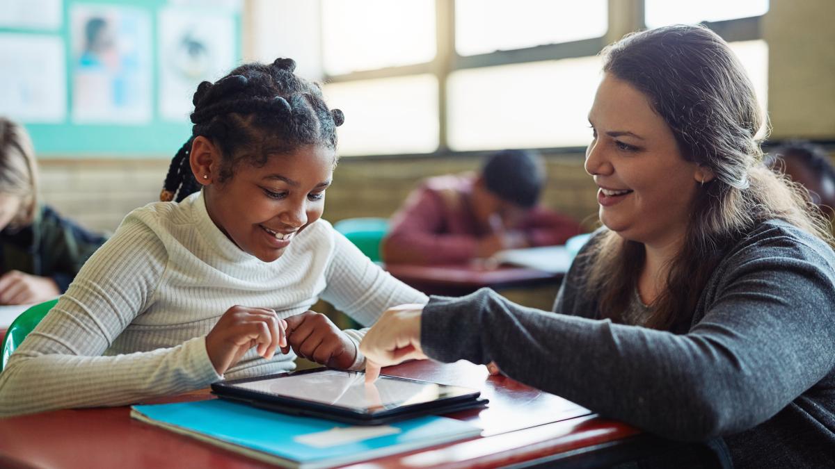 Teacher interacting with student