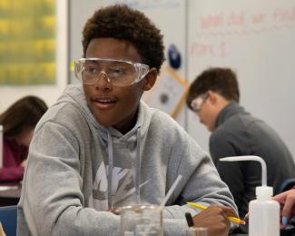 student in science classroom