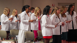 Dietetic Interns recite an oath